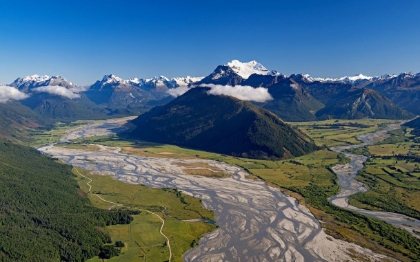 Aerial scenic view of mountains, rivers and green bush