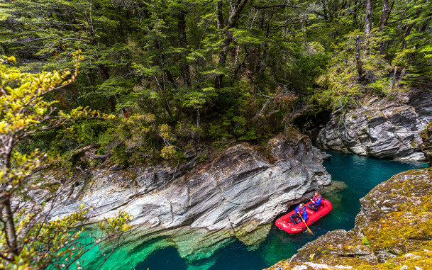 Funyak group floating through the chasms on the Dart River