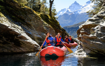 Funyak group paddling inflatable kayaks in the Rockburn Chasm