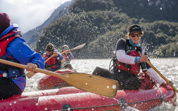 Funyak guide paddling through the Dart River on inflatable kayak